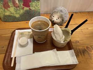 Pistachio and chestnut 🌰 ice cream, with a coffee, served with almond milk  at Riccio d'Oro in Kobe