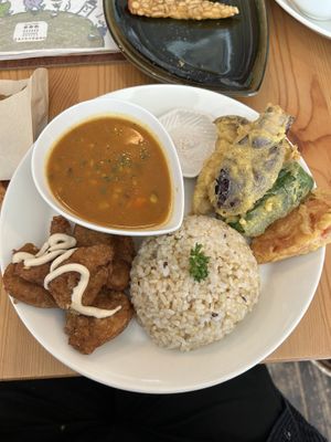 Lunch plate: curry, tenpura, rice, soya nuggets  at Marugoto Vegan Dining Asakusa in Tokyo
