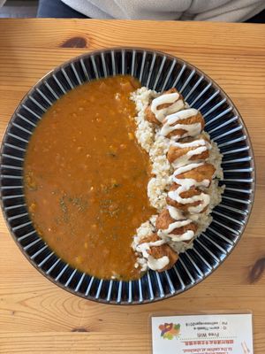 Curry, rice and fried soy beans bits   at Marugoto Vegan Dining Asakusa in Tokyo