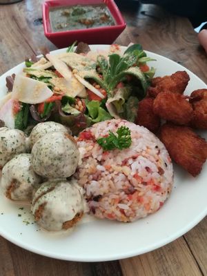 Plate with three optional dishes. at Marugoto Vegan Dining Asakusa in Tokyo