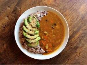Avocado topping curry with rice at Marugoto Vegan Dining Asakusa in Tokyo