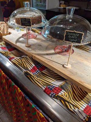 Vegan cakes, raw cakes in the fridge at Kilimanjaro Take Me Away in Amsterdam