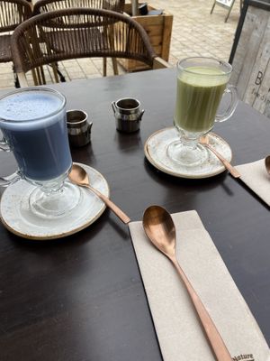 Blue spirulina and matcha latte, both with coconut milk and a shot of espresso at Byoko in Malaga