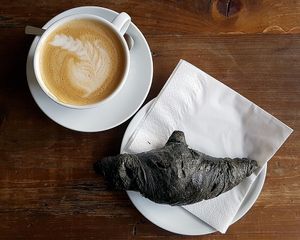 Vegan croissant and large cappuccino with oat milk at Nah am Wasser - Neukölln in Berlin