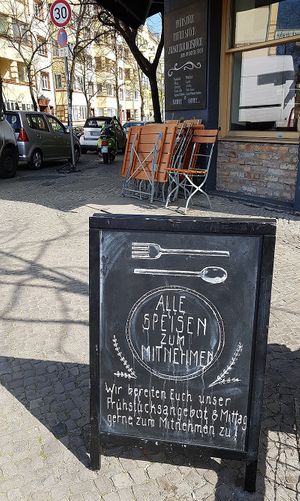 Note saying that due to the current Corona crisis, food is available only for take-away (including breakfast and lunch menu). at Nah am Wasser - Neukölln in Berlin
