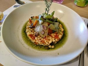 Sardinia pasta, summer vegetables, and spirulina at Restaurant Comte Roger in Carcassonne