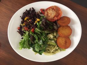 Black rice and veggies, roasted tomato, salad and panisses (local specialty made of chickpea flour) at La Table à l'Envers in Marseille