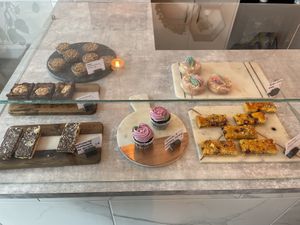 Vegan: biscoff and caramel cookie cup, chocolate and raspberry cupcake, rainbow cronut  at Hampton & Vouis in Manchester