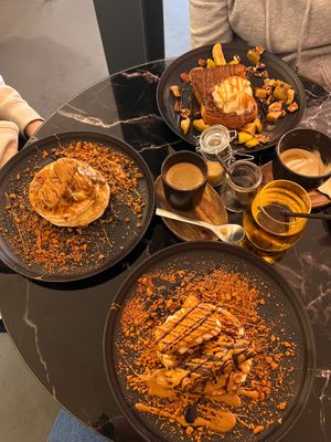 Apple & Cinnamon French Toast. 
Vegan Biscoff Pancakes.
Vegan Biscoff & 'Bueno' pancakes (They use LoveRaw for the Bueno). 
 at Hampton & Vouis in Manchester