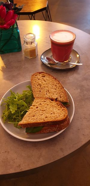 Great tasting beetroot latte for £3 and a lovely sourdough sandwich with avocado, spinach and tomatoes at Hampton & Vouis in Manchester