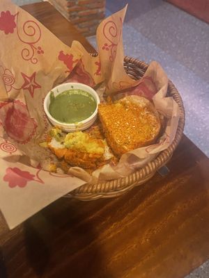 Ultra Vadapav: potato filling vegan pav laced with chutney’s covered in chickpea flour deep fried, chili and chutney  at Masala Dosa Street Kitchen - MDSK in Phnom Penh