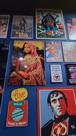 Movie posters -- see the Monalisa with henna :). at Masala Dosa Street Kitchen - MDSK in Phnom Penh