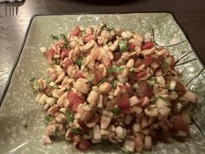 Peanut salad with tomatoes  at Masala Dosa Street Kitchen - MDSK in Phnom Penh