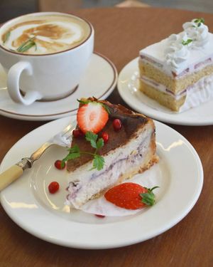 Strawberry baked cheesecake, GF strawberry and cream cake, and lavender soy latte. at Pyeongsangshi 평상시 in Seoul