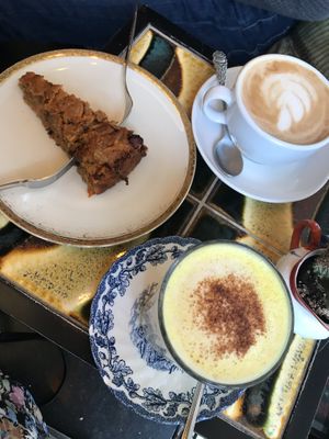 Coffee,Kurkuma Latte and Cake at vevi Café - vegan specialities in Cologne