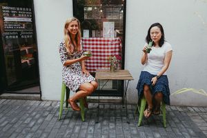 Enjoying smoothies and bowls outside of shop  at Lizzy's All Natural - Changhua in Shanghai