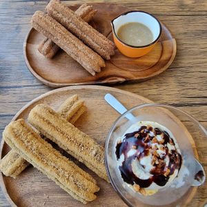 Top: cinnamon churros with caramel.  Bottom: vanilla ice cream with plain churros. at Shizen Inu - We Are Vegan Cafe - 自然いぬ   in Yomitan