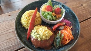 Scrambled eggs and hamburger steak with demi-glace sauce at Shizen Inu - We Are Vegan Cafe - 自然いぬ   in Yomitan