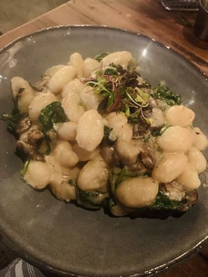 Delicious dumplings and mushrooms cream sauce  at Southern Social in Vero Beach