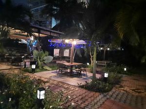 Tranquil evening dining environment.  at Loving Hut in Kinshasa