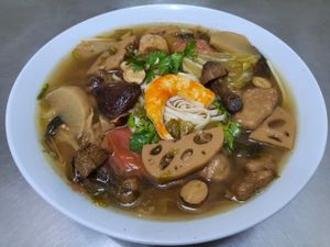 Vegan pickled cabbage noodle soup. at Loving Hut in Kinshasa