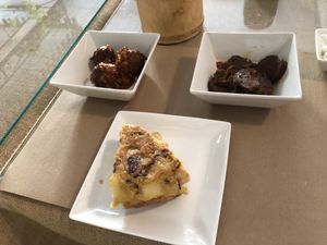 Top left lentil Albóndigas, top right vegan chorizo, bottom vegan tortilla  at BioWinds in Fuengirola