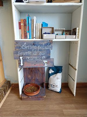 Little dogfood station at the door. This is a place that really cares about animals, and the food is wonderful! at BioWinds in Fuengirola