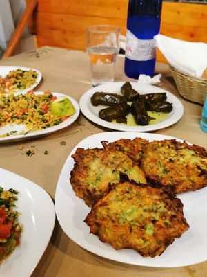Zucchini pies and dolmadakia (stuffed wine leaves) at Noah's Ark in Kos