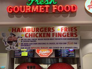 It reads, cooked on a separate grill  at EddieWorld in Yermo