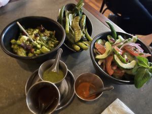 kachumber, chilli broccoli salad, bowl of greens  at Dishoom - Carnaby in London