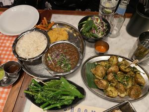 Chole puri, bowl of greens and gunpowder potatoes   at Dishoom - Carnaby in London