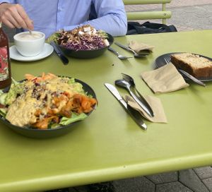 Superfood bowl, kebab bowl, cappuccino and a banana bread  at Vedans in Bayreuth