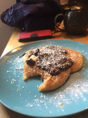 Pancakes with chocolate coconut sauce (we took the bite out of them!) at MamGu Welshcakes in Harverfordwest