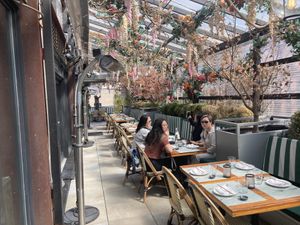 Outdoor roof deck, dining  at Catch in New York City