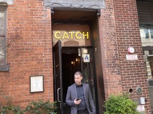 Entrance, on 13th St., you need to take the elevator to get to the restaurant  at Catch in New York City