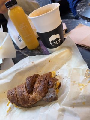 Doesn’t look that great but it was…. a vegan croissant with cheese, burger and a Fall coffee with maple syrup and cinnamon   at Gregory's Coffee - 7th Ave in New York City
