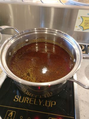 Sichuan spicy broth at Surely Up Vegetarian Hotpot in Richmond Hill