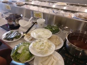 Piles of delicious goodies for $2 a plate at Surely Up Vegetarian Hotpot in Richmond Hill