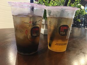 Winter Melon Green Tea with tapioca (left) and mango popping bubbles (right) at Kung Fu Tea in Katy