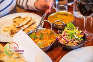 Vegan Wine,  Naan bread, Aloo Gobi Aloo, yellow dal.
All meal Vegan at India Ocean Restaurant  in Christchurch