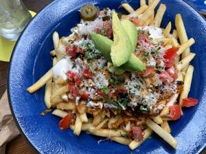 Carnitas nacho fries at Om Sabor in San Francisco