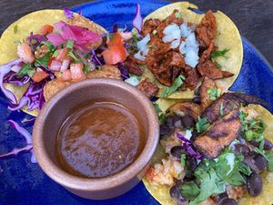 Baja Cali, al pastor, and Caribbean tacos at Om Sabor in San Francisco
