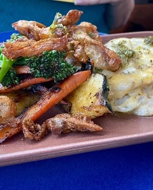 Potato cheese gratin with crispy mushrooms at Om Sabor in San Francisco