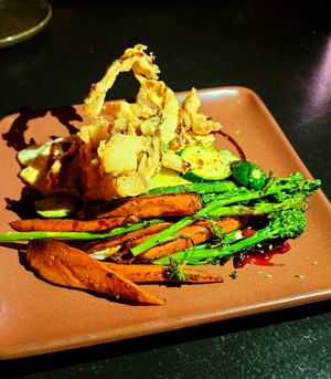 Potato cheese gratin + crispy mushrooms at Om Sabor in San Francisco