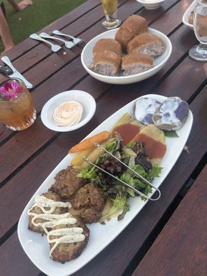 Tofu nuggets, seitan steak, root veggies, salad, eggplant, uala, and taro bread rolls at Old Lahaina Luau in Lahaina