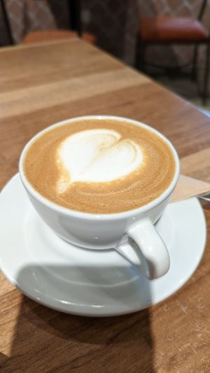 Flat white with almond milk at 7 Campanarios Cafe del Ecuador in Quito