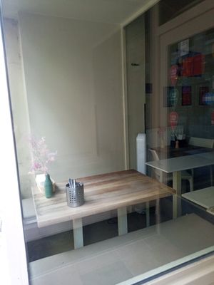 Seating area by the window at Suppenwirtschaft in Vienna