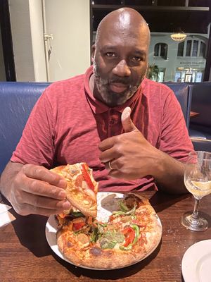 Pizza with all of the toppings  at Ethos Vegan Kitchen in Winter Park