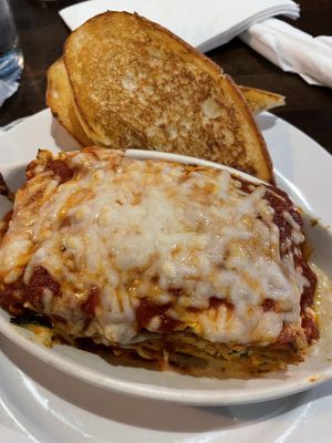 Vegan lasagna with garlic bread   at Ethos Vegan Kitchen in Winter Park