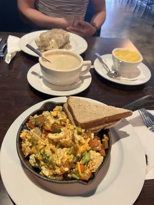 Breakfast skillet, breakfast burrito, cup of grits and huge cappuccino   at Ethos Vegan Kitchen in Winter Park